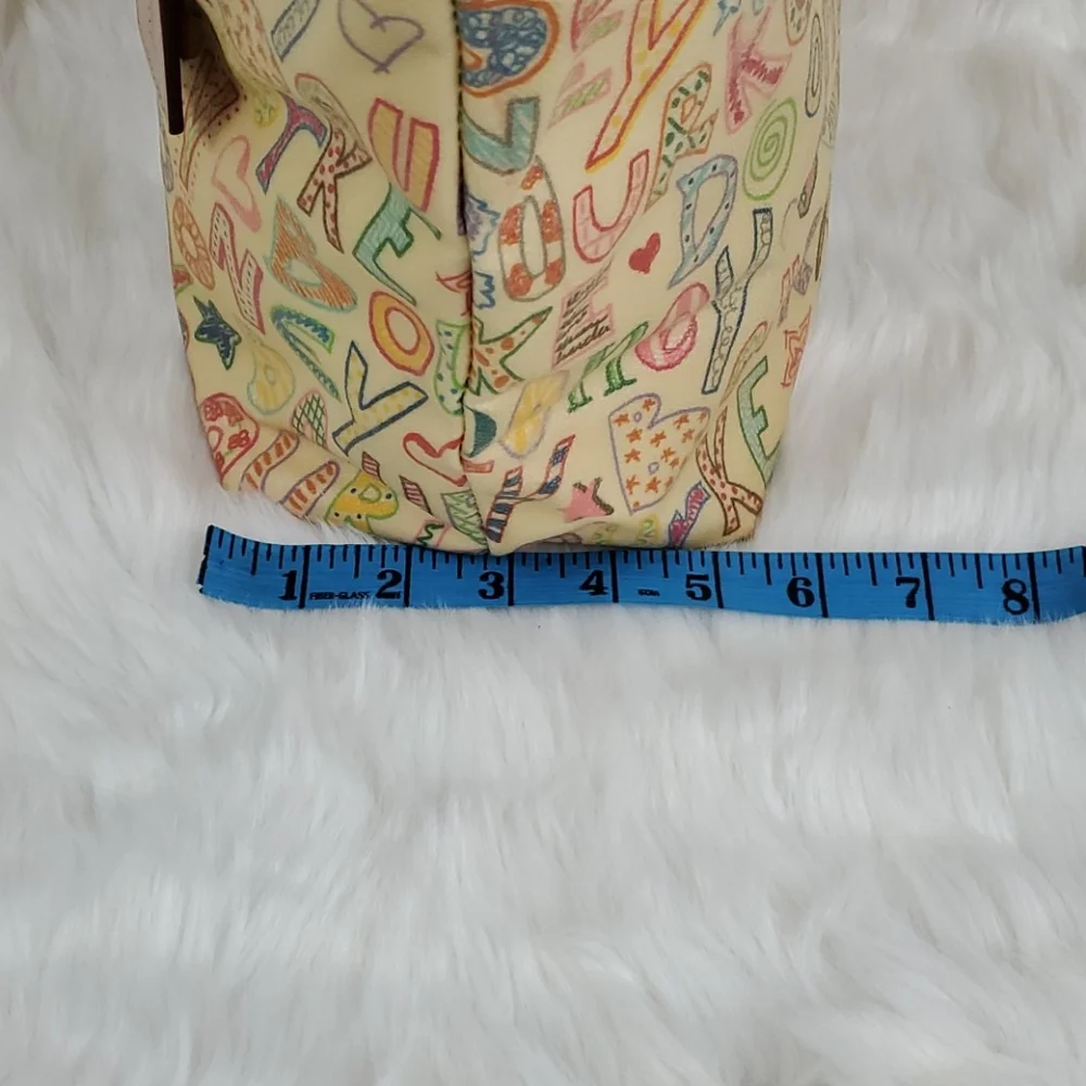 Dooney Bourke cream shoulder leather purse bag
